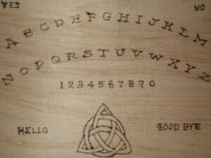hand made ouija board close up Seek the Gospel Truth a Handmade Ouija Board